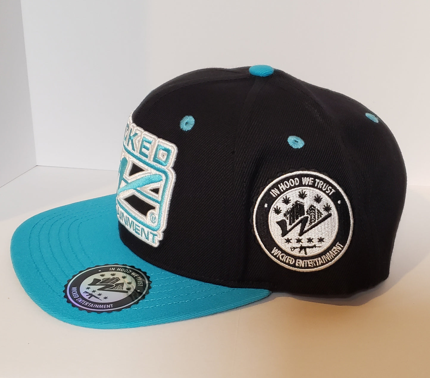 Wicked Logo Snapback hat - Black and Baby Blue with Blue Brim